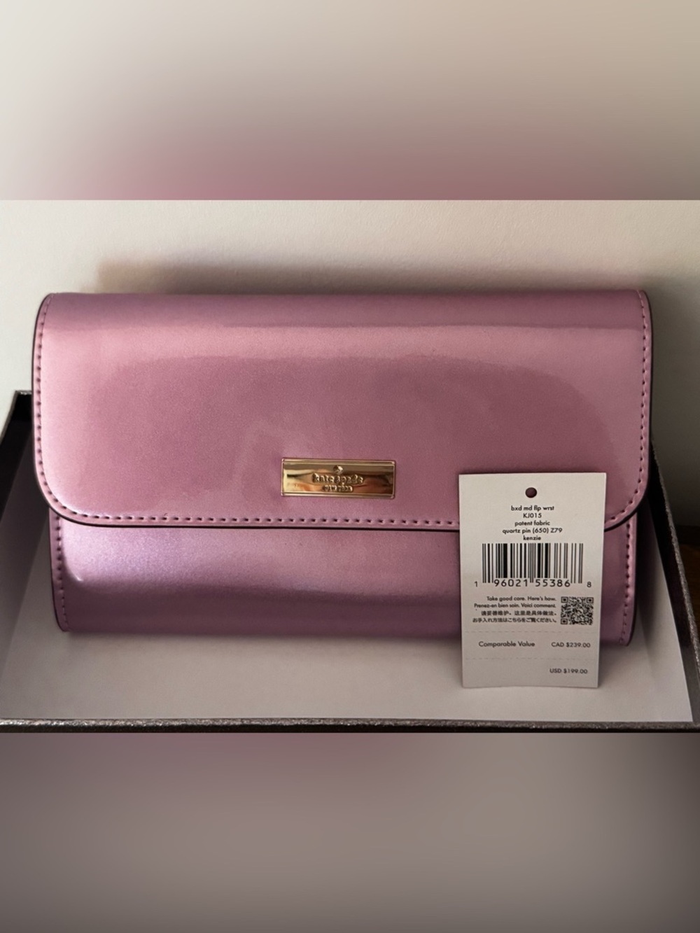 kate spade Metallic Pink Fold-Over Clutch with Gold Plaque